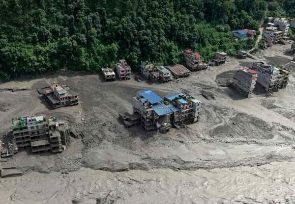 Hundreds reported missing after flash flood on Nepal border with China